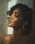NOIREL NRL010 close-up of a face with smoky eyes and gold hoop earrings