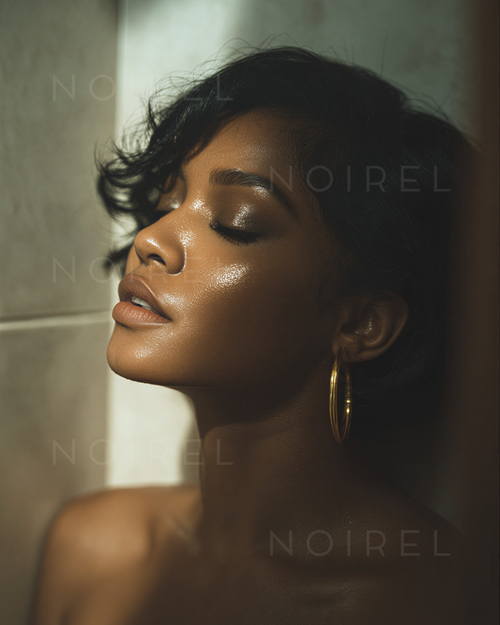 NOIREL NRL010 close-up of a face with smoky eyes and gold hoop earrings