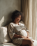 NOIREL Seasons of Life dress in light linen with long puff sleeves and relaxed neckline