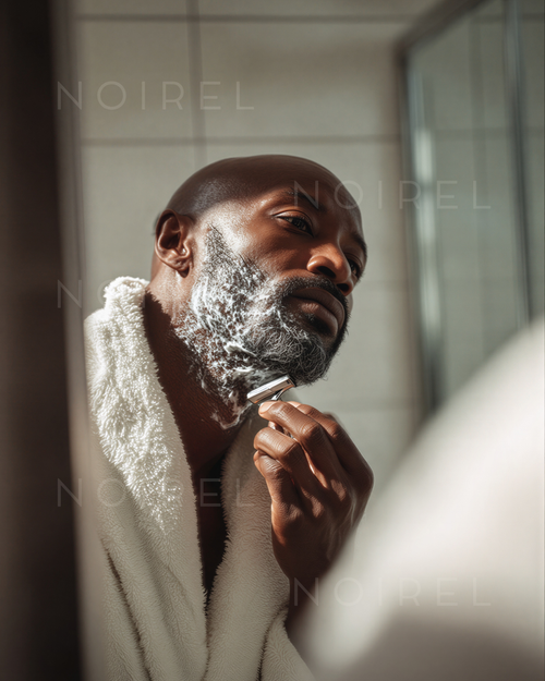 Man applying grooming product to beard, dark skin, close-up grooming action