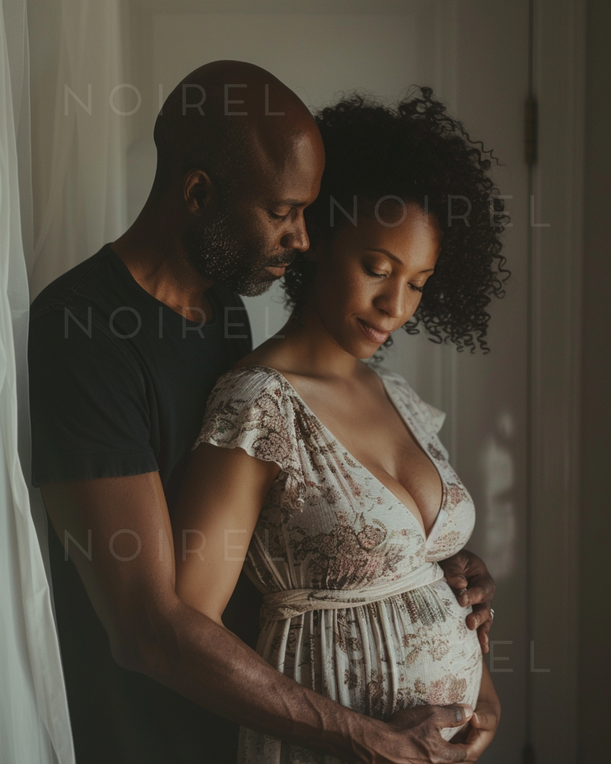 Floral maternity wrap dress with V-neck, short sleeves, and tied waist