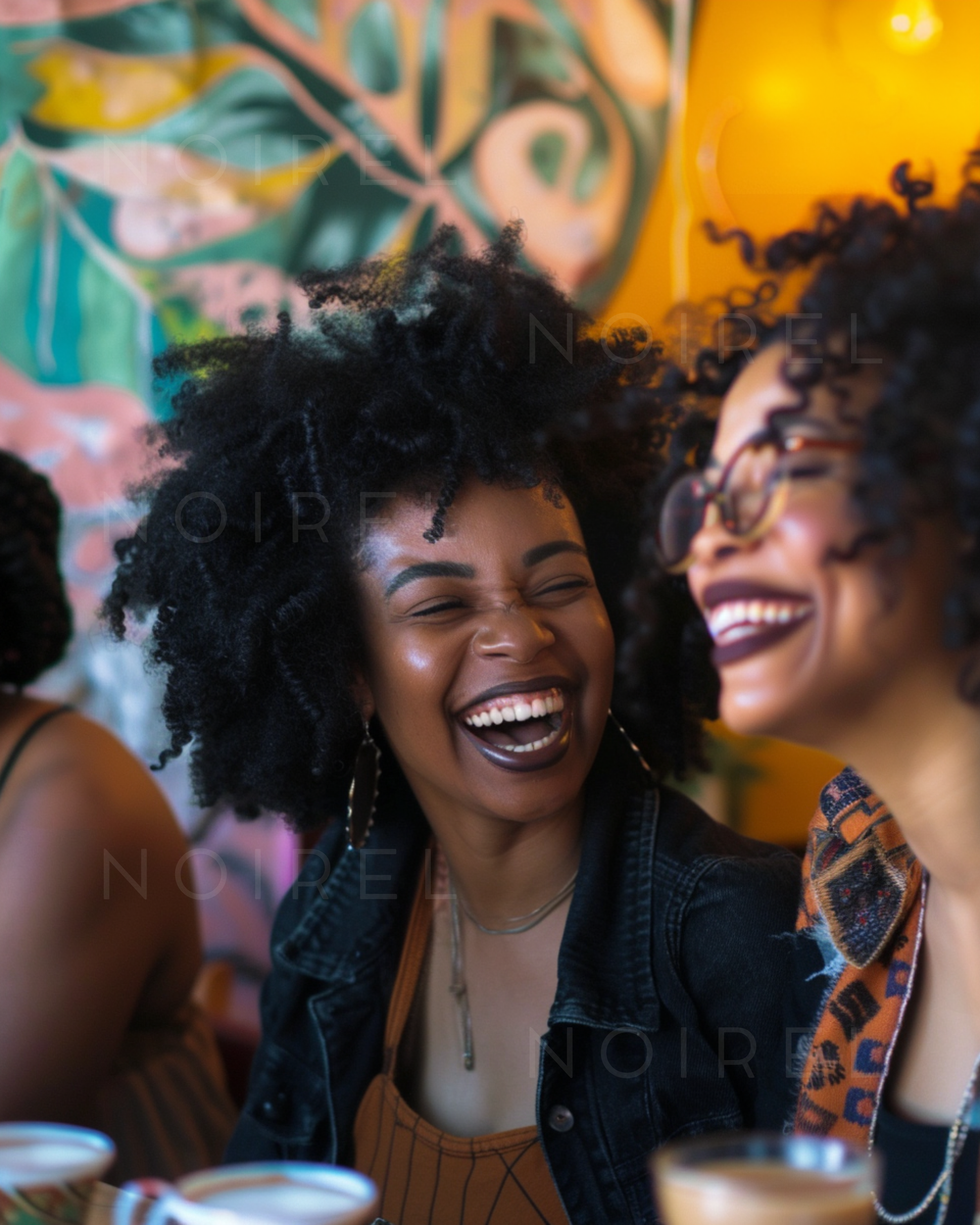 Black denim jacket, button front, curly hair and smiling group in close-up