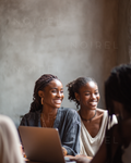 Groups & Families NRL219: two smiling women using a tablet