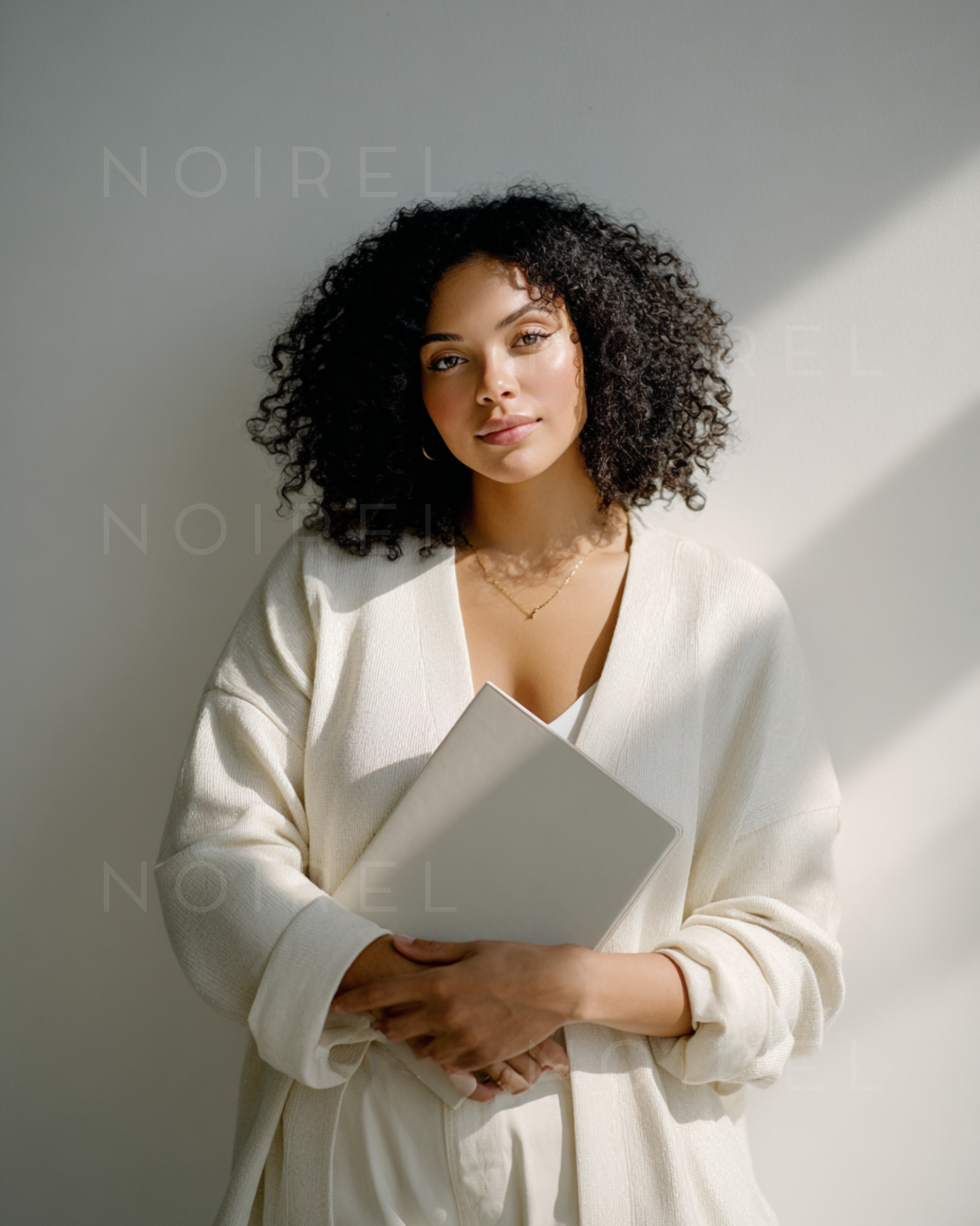NOIREL cream cardigan with deep V-neck and long sleeves, front button placket
