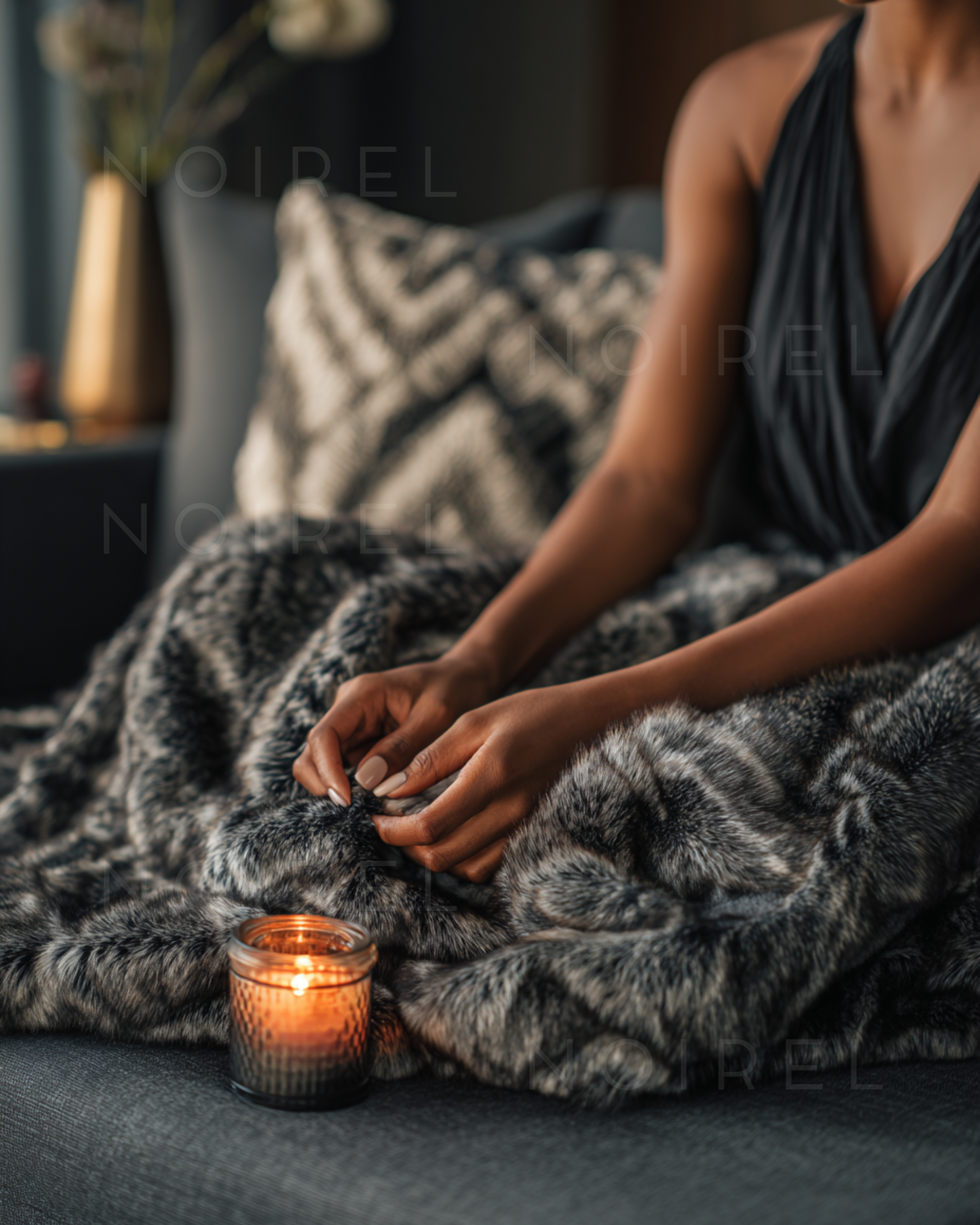 NRL250 faux-fur throw blanket with dark gray and black zebra-style pattern