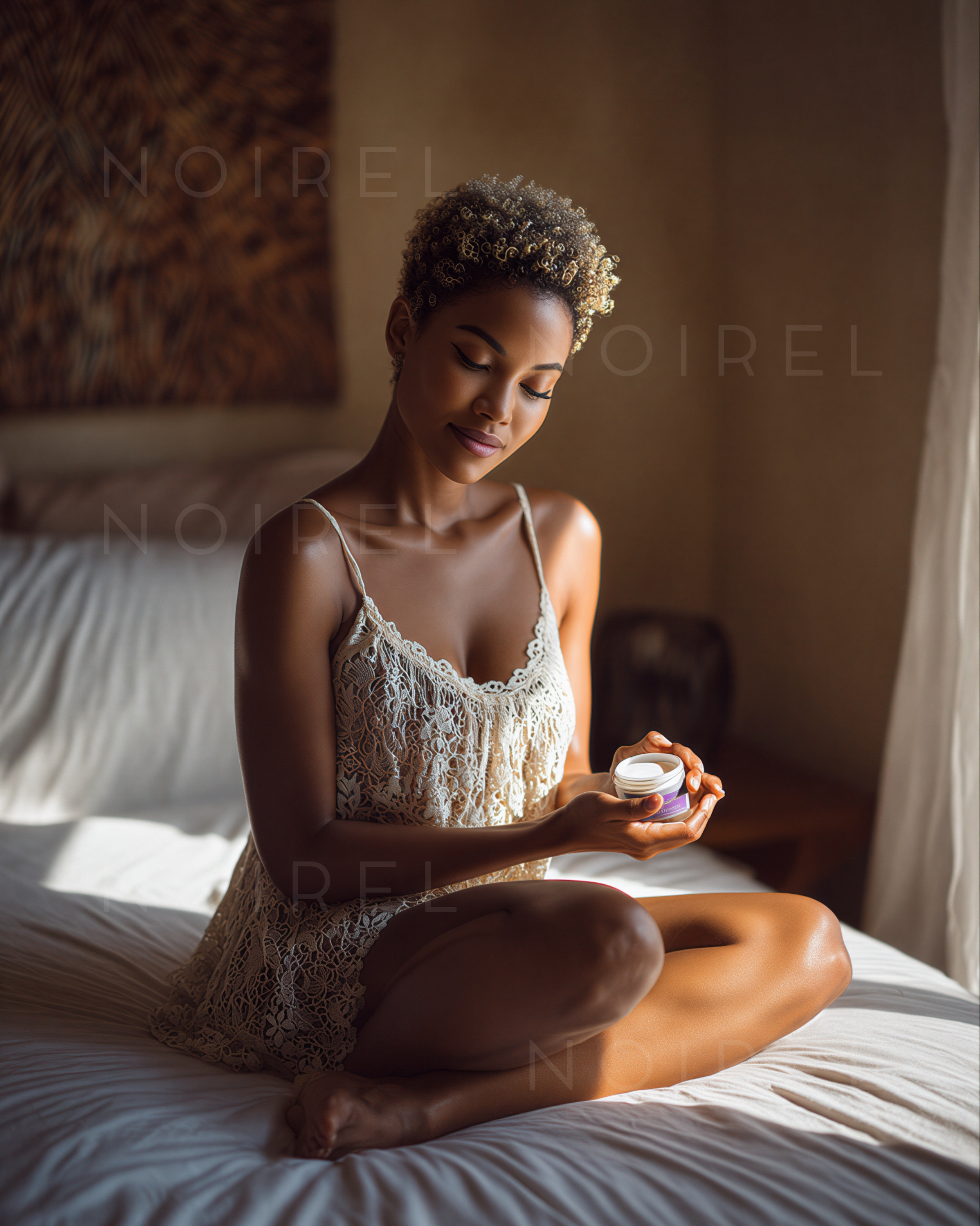 Small round skincare cream jar held in hand